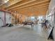 Unfinished basement with exposed rafters is a blank canvas ready to be built out at 19155 Robins Dr, Denver, CO 80249