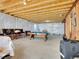 Unfinished basement features a pool table and the opportunity to make the space your own at 19155 Robins Dr, Denver, CO 80249