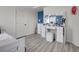 A bright room with a vanity in the corner next to a white door at 19155 Robins Dr, Denver, CO 80249