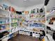 Walk-in pantry features open shelving to store all your food and appliances at 19155 Robins Dr, Denver, CO 80249