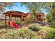 Charming backyard with multiple gazebos and lush landscaping at 1439 S Emerson St, Denver, CO 80210