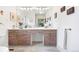 Bathroom featuring an expansive vanity with stylish lighting and a large mirror at 1439 S Emerson St, Denver, CO 80210