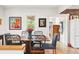 Comfortable dining room featuring hardwood floors, bright windows, and art, creating a inviting space at 1439 S Emerson St, Denver, CO 80210