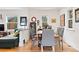 Cozy dining room with hardwood floors, natural light, and stylish decor, perfect for Gathering meals at 1439 S Emerson St, Denver, CO 80210