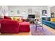 Bright and airy living room with hardwood floors, comfortable seating, and stylish decor at 1439 S Emerson St, Denver, CO 80210