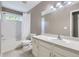Bathroom featuring a shower-tub combination, and a white vanity with ample counter space at 9890 Gaylord St, Thornton, CO 80229