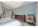Spacious main bedroom features a large dresser, neutral carpet, and bright natural light at 9890 Gaylord St, Thornton, CO 80229