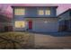 Charming two-story home with a red front door and well-maintained lawn in a residential neighborhood at 4774 Waldenwood Dr, Highlands Ranch, CO 80130
