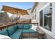 Inviting deck with comfortable seating and shade, ideal for outdoor relaxation and entertaining guests at 11032 Cannonade Ln, Parker, CO 80138