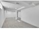 Finished basement showcasing modern recessed lighting, neutral walls and carpet at 2800 Albion St, Denver, CO 80207