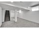 Finished basement with recessed lights, gray carpet, and neutral paint at 2800 Albion St, Denver, CO 80207