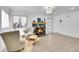 Inviting living room with a fireplace, hardwood floors, and natural light at 2800 Albion St, Denver, CO 80207