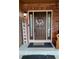 Inviting front door with decorative wreath, sidelights, and 'Welcome' sign at 5405 S Sicily St, Aurora, CO 80015
