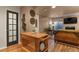 Finished basement area with kitchenette, TV, and plenty of space at 5405 S Sicily St, Aurora, CO 80015