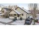 Front view of the house with porch at 141 N 5Th Ave, Brighton, CO 80601