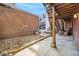 Backyard with brick wall and overhead patio at 1610 N Humboldt St # 1/2, Denver, CO 80218