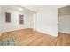 Bedroom with hardwood floors and decorative rug at 1610 N Humboldt St # 1/2, Denver, CO 80218