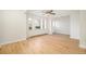 Bright living room featuring hardwood floors and three large windows at 1610 N Humboldt St # 1/2, Denver, CO 80218