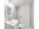Bathroom featuring a granite sink and modern faucet at 10329 W Fair Ave # C, Littleton, CO 80127