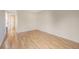 Bright bedroom with hardwood floors and neutral paint at 10329 W Fair Ave # C, Littleton, CO 80127