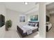 Bright bedroom with contemporary furnishings and decor at 10329 W Fair Ave # C, Littleton, CO 80127