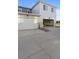 Townhome with driveways leading to spacious two car garages at 27492 E 1St Ave, Aurora, CO 80018