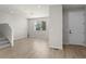 Bright living area with hardwood floors and staircase leading to upper level at 27492 E 1St Ave, Aurora, CO 80018