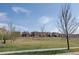 Scenic view of the community featuring well-maintained lawns, walking path and gazebo for residents at 15569 W La Salle Ave, Lakewood, CO 80228