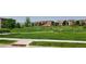 Beautiful community park with lush green grass, walking paths, and shaded gazebo at 15569 W La Salle Ave, Lakewood, CO 80228