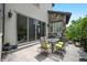 Charming patio with dining set, perfect for entertaining and enjoying outdoor meals at 15569 W La Salle Ave, Lakewood, CO 80228