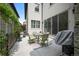 Outdoor patio with dining set, perfect for entertaining and enjoying the backyard view at 15569 W La Salle Ave, Lakewood, CO 80228