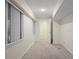 Simple basement bedroom with carpet and window at 10350 W Burgundy Ave, Littleton, CO 80127