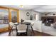 Cozy dining area with a view and hardwood floors at 10350 W Burgundy Ave, Littleton, CO 80127