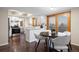 Bright kitchen with stainless steel appliances and white cabinets at 10350 W Burgundy Ave, Littleton, CO 80127