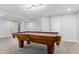 This basement has a vintage pool table ready for entertaining at 2014 S Pagosa St, Aurora, CO 80013