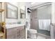 This bathroom features stylish vanity and tiled walk-in shower with modern fixtures at 2014 S Pagosa St, Aurora, CO 80013