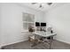 This bedroom can be used as an office, featuring large windows for natural light at 2014 S Pagosa St, Aurora, CO 80013