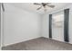 This bedroom features large windows for natural light and spacious closet at 2014 S Pagosa St, Aurora, CO 80013