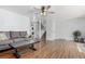 Living room features hardwood floors, and stairs to the second level at 2014 S Pagosa St, Aurora, CO 80013