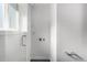 Bright laundry room with washer/dryer hookups, glass-doored cabinets, and ample wall space at 4752 E 108Th Pl, Thornton, CO 80233