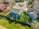 Green home situated on a well-maintained lot, featuring a backyard and a charming neighborhood setting at 483 S Kingston Cir, Aurora, CO 80012