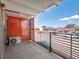 Spacious balcony with metal railings offers a peek view of city at 1495 Vrain St # 214, Denver, CO 80204