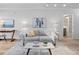 Cozy living room with a gray sofa, stylish coffee table, and an inviting atmosphere enhanced by tasteful decor at 1495 Vrain St # 214, Denver, CO 80204