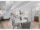 Well-lit open-concept living space with combined living, kitchen, dining, and sleeping areas for modern living at 1495 Vrain St # 214, Denver, CO 80204