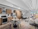 Open living space with a well-equipped kitchen, dining area, cozy living space, and a comfortable sleeping area at 1495 Vrain St # 214, Denver, CO 80204