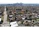 An aerial view captures the home's location near the city with views of the surrounding neighborhood at 2850 Lowell Blvd, Denver, CO 80211