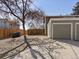 The property includes a spacious driveway, garage and fenced-in backyard, offering ample outdoor space at 2850 Lowell Blvd, Denver, CO 80211