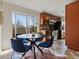 Bright eat-in kitchen with sliding glass doors leading to the backyard and stainless steel appliances at 2850 Lowell Blvd, Denver, CO 80211