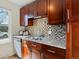 Updated kitchen with stainless steel dishwasher, and stainless steel sink and granite countertops at 2850 Lowell Blvd, Denver, CO 80211
