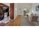 Spacious living area with hardwood floors that leads to the kitchen at 2850 Lowell Blvd, Denver, CO 80211